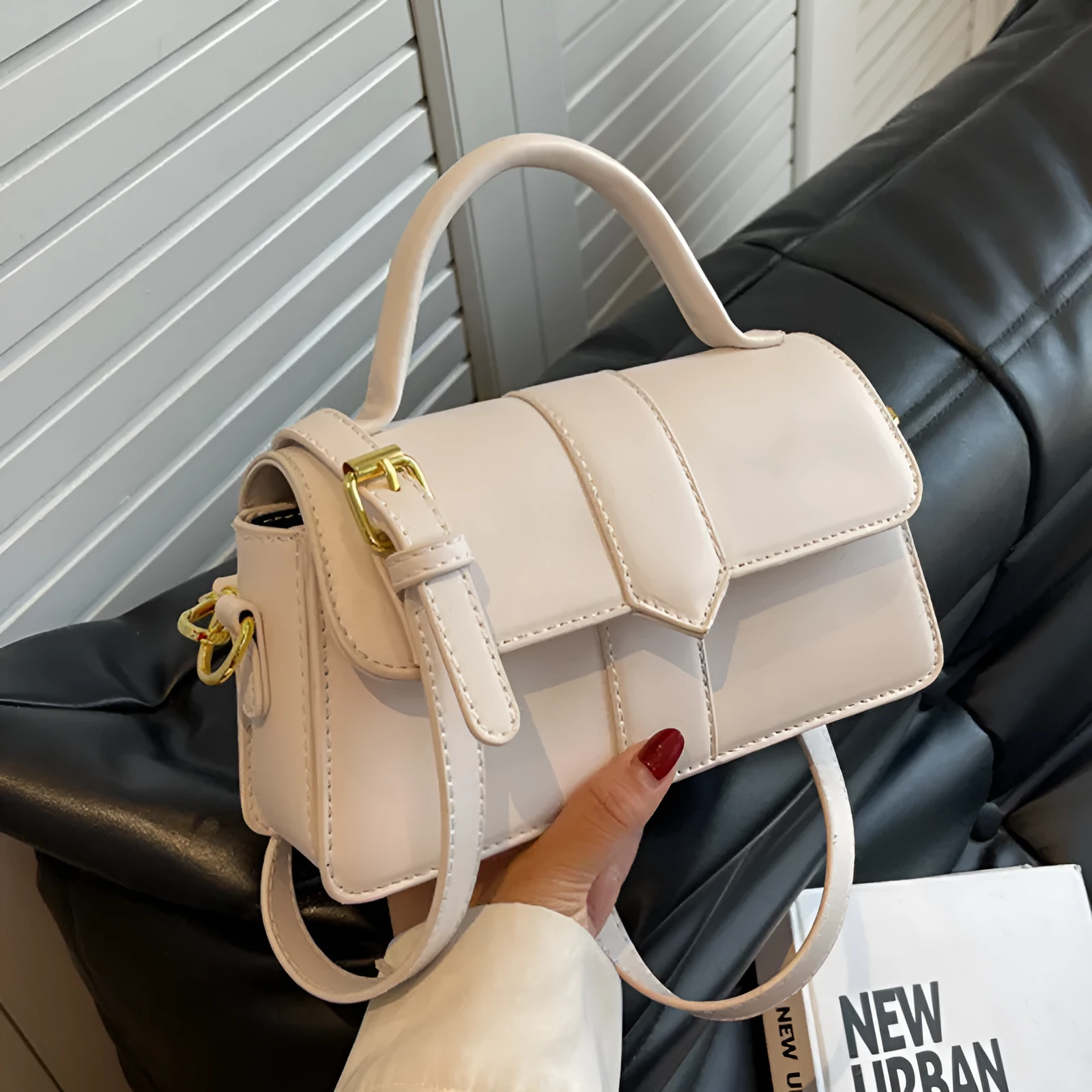 Women's PU leather messenger bag in neutral colour with file organiser interior and sandwich pocket