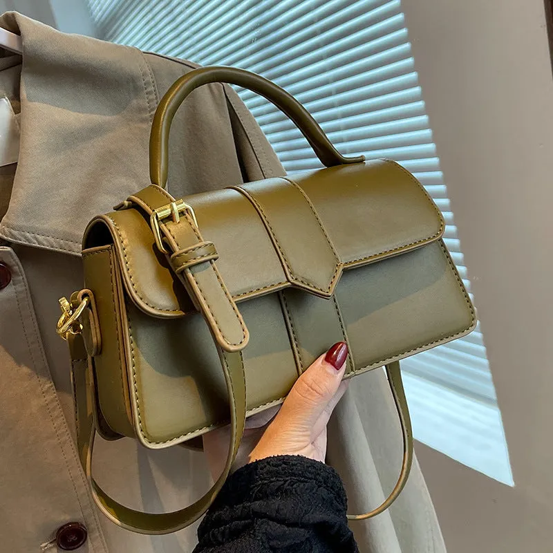 Women's PU leather messenger bag in neutral colour with file organiser interior and sandwich pocket