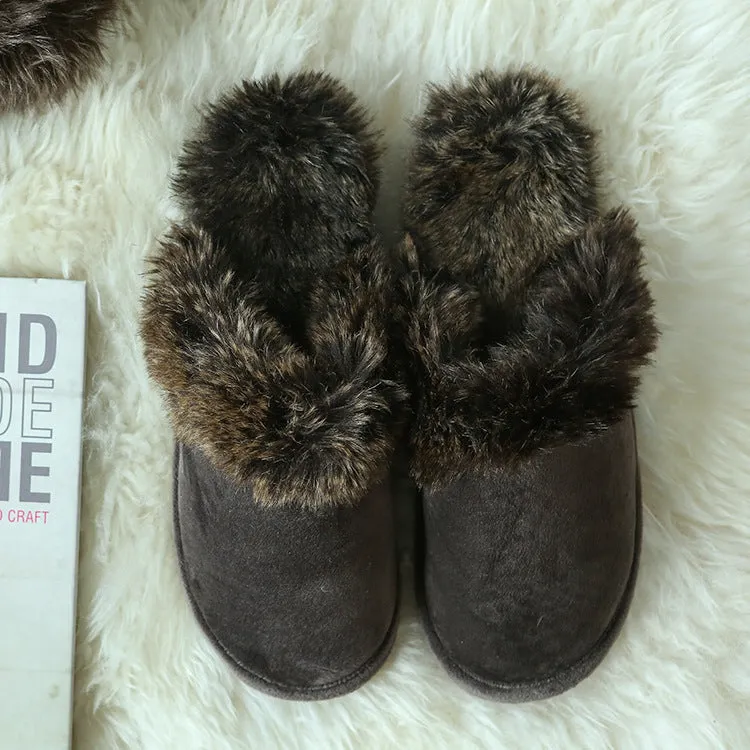 Couple wearing warm beige suede wool slippers with non-slip rubber sole indoors