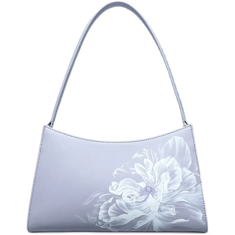 Light purple cowhide leather handbag with zipper closure, compact size for everyday use