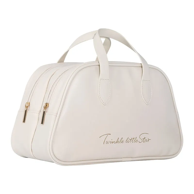 Large capacity PU leather travel toiletry bag in caramel mocha colour showing dry wet separation compartments.