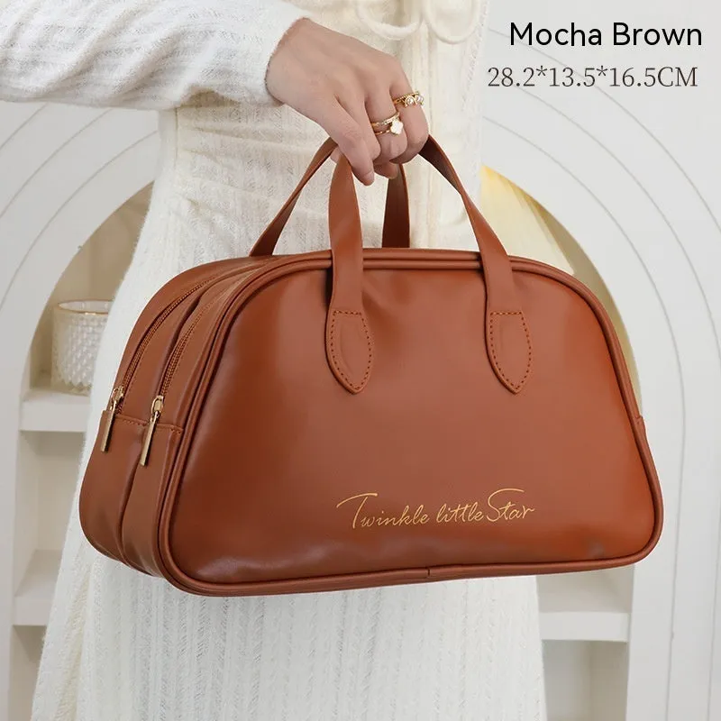 Large capacity PU leather travel toiletry bag in caramel mocha colour showing dry wet separation compartments.