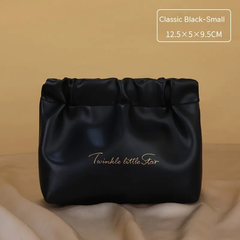 Large capacity PU leather travel toiletry bag in caramel mocha colour showing dry wet separation compartments.