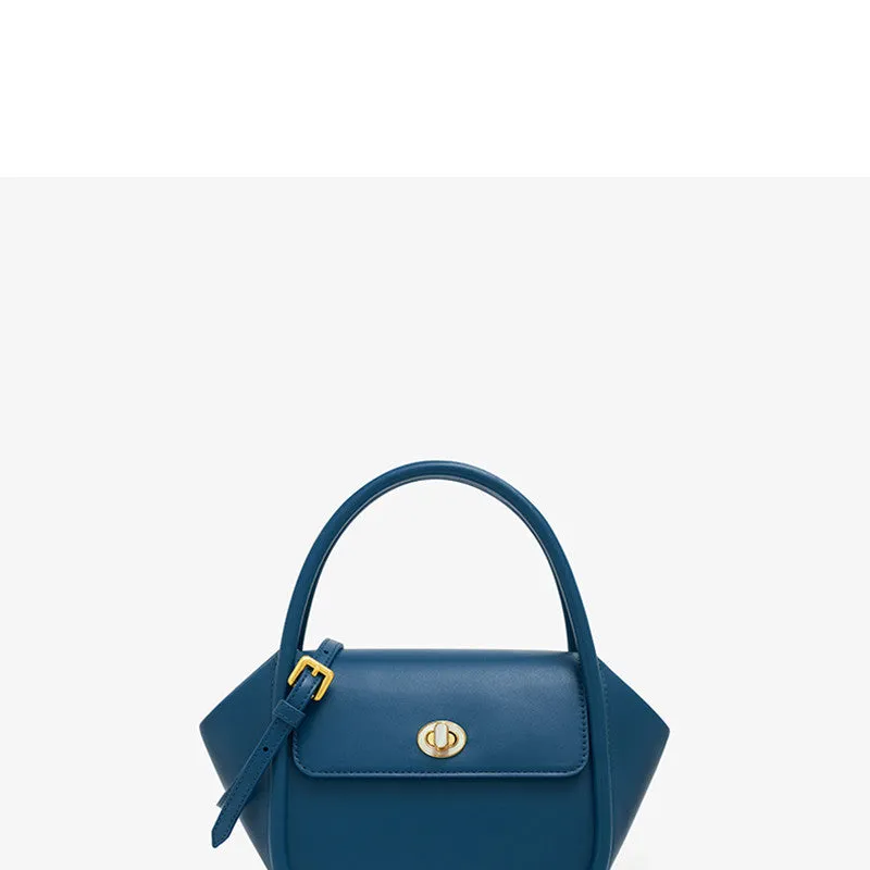 Women's leather wing shape tote bag with cross-body strap in four colour options showing buckle detail