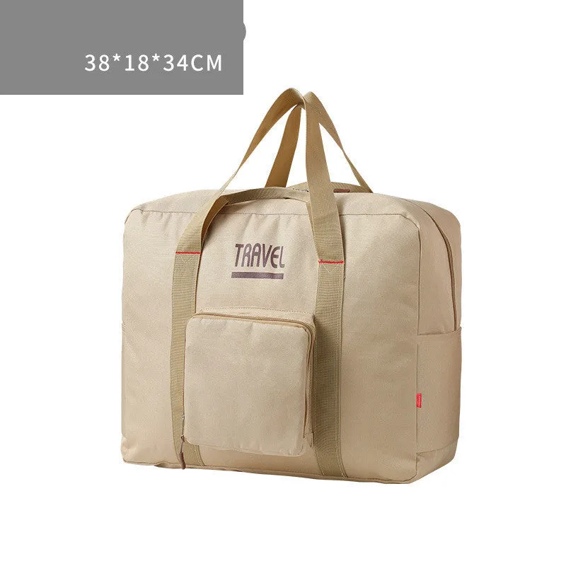 Foldable large capacity canvas travel bag in grey with soft handle and zipper pocket