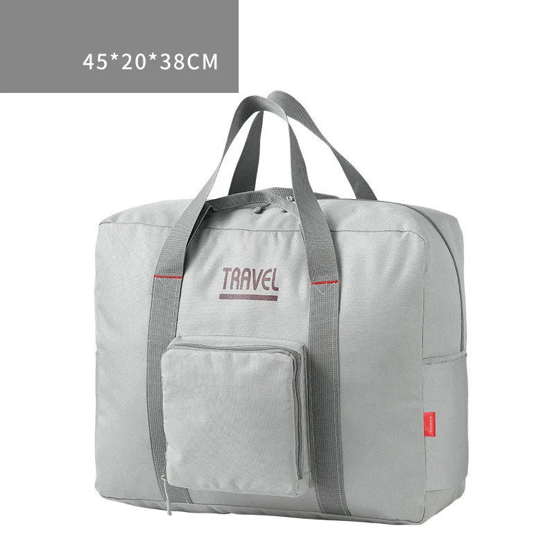 Foldable large capacity canvas travel bag in grey with soft handle and zipper pocket
