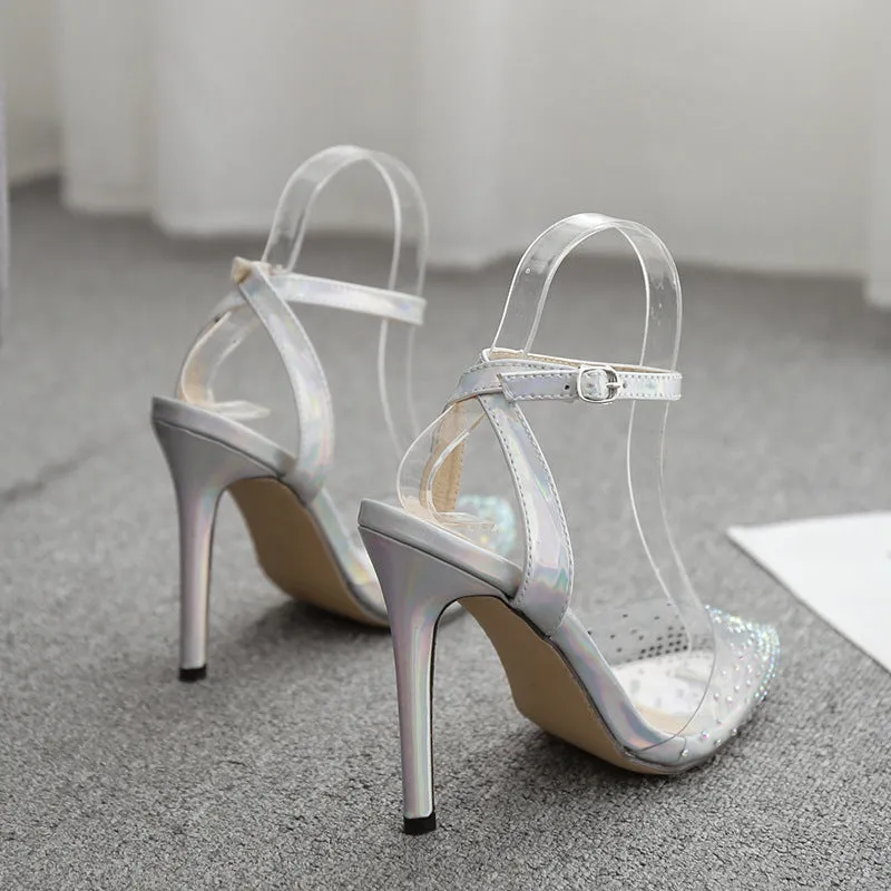 Gold glitter pointed toe stiletto sandals for women on a white background