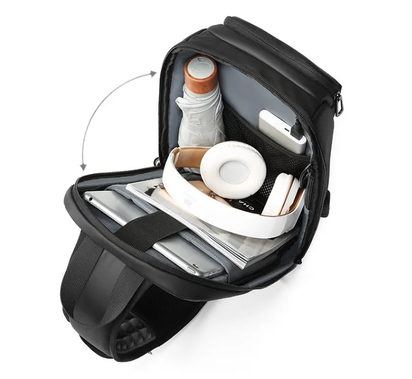 Black PVC outdoor leisure shoulder bag with a single strap, showing dedicated pockets for ID, phone, and computer.
