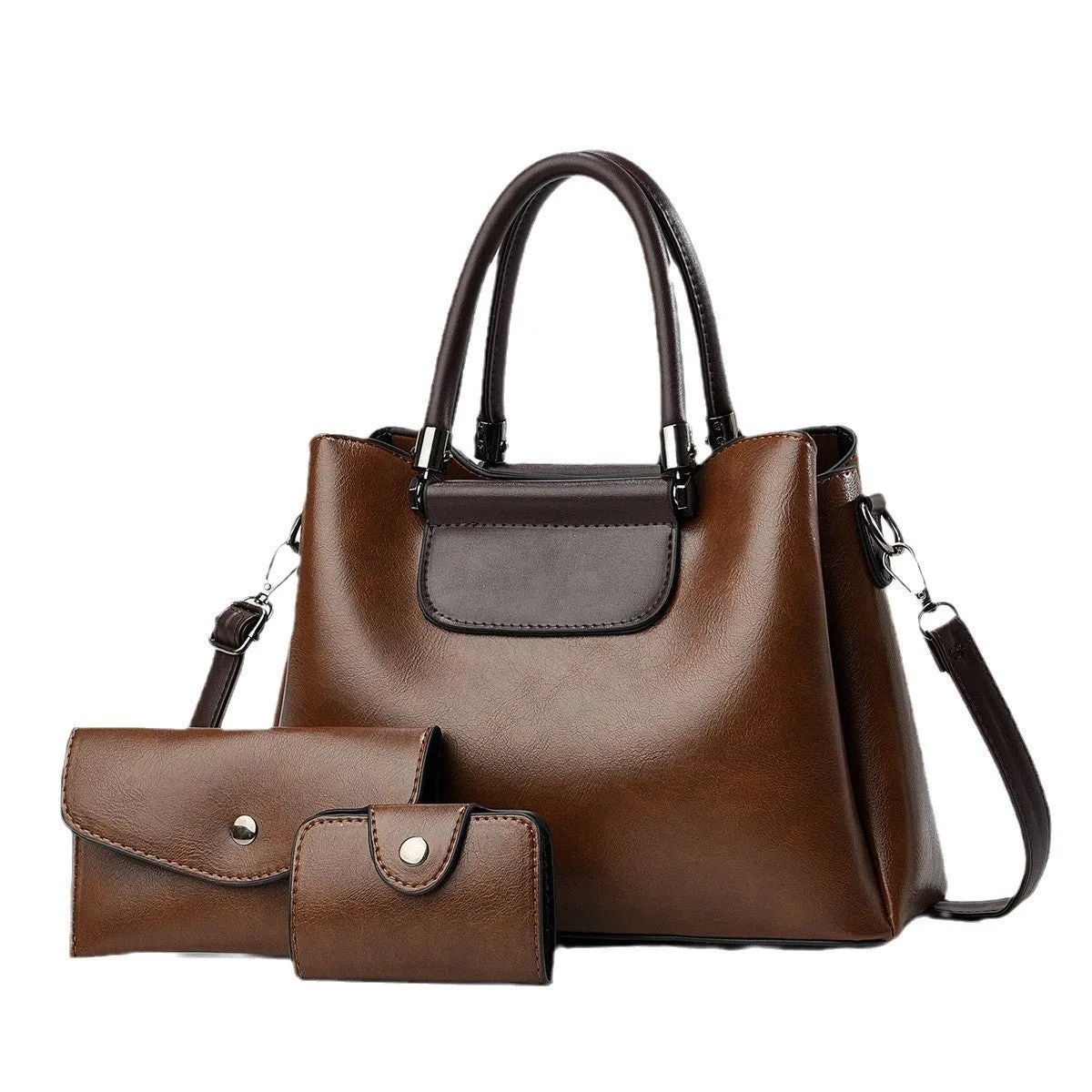 Large PU leather handbag set in horizontal square shape with matching medium and small pouches on white background