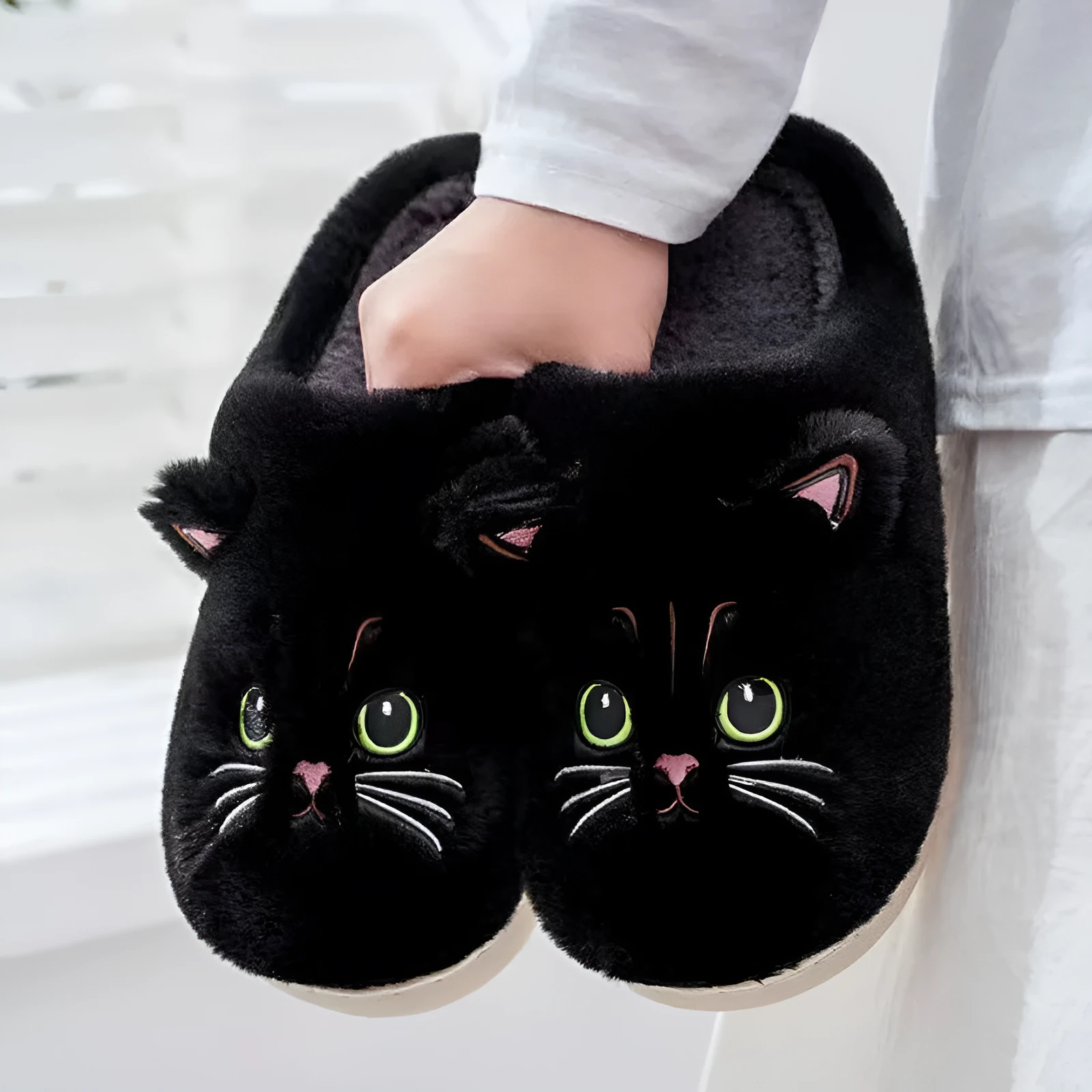 Cute cat plush slippers with non-slip EVA sole, thickened design, available in pink colour on a floor surface