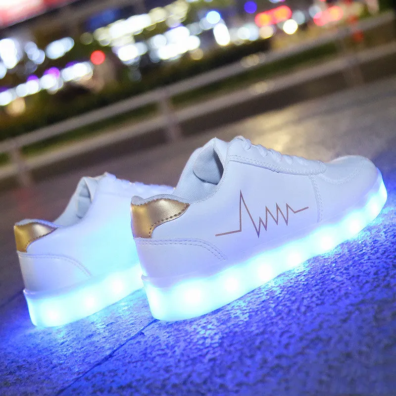 Women's USB-charging LED luminous shoes in gold with low-top lace-up design and round toe on a white background