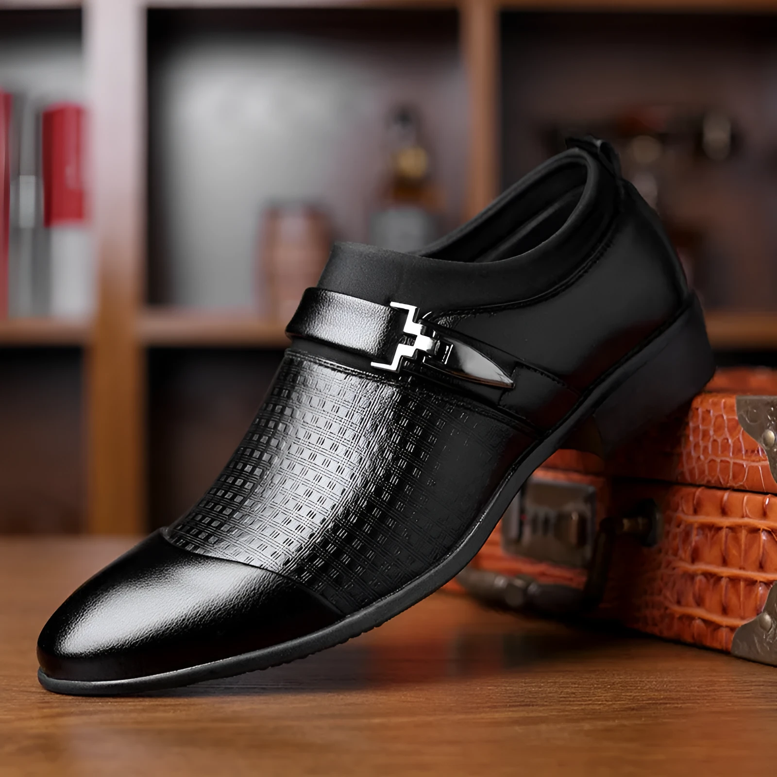 Men's black business formal PU leather shoes with non-slip rubber sole on a grey background