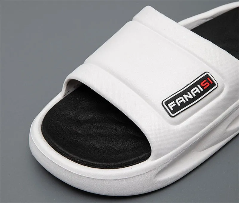 Pair of soft-tech PVC arch support slippers in black green for plantar fasciitis relief