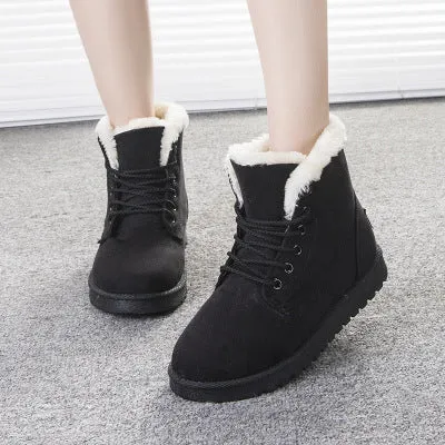 Women's lace up platform snow boots in suede with faux fur lining, flat heel, round toe, available in multiple colours