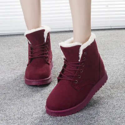 Women's lace up platform snow boots in suede with faux fur lining, flat heel, round toe, available in multiple colours