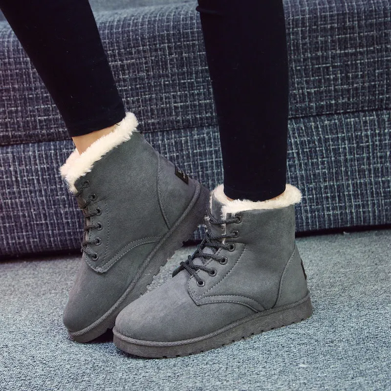 Women's lace up platform snow boots in suede with faux fur lining, flat heel, round toe, available in multiple colours