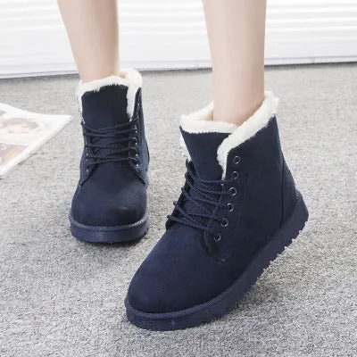 Women's lace up platform snow boots in suede with faux fur lining, flat heel, round toe, available in multiple colours