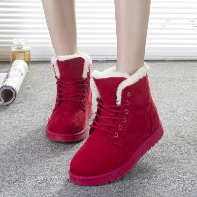 Women's lace up platform snow boots in suede with faux fur lining, flat heel, round toe, available in multiple colours