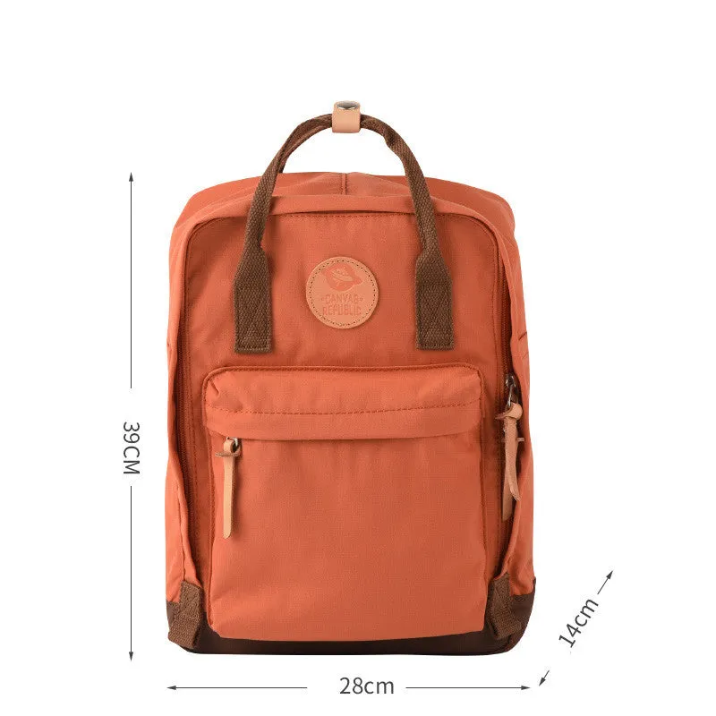 Polyester backpack with water repellent finish, zipper closure, and computer pocket, available in hit colours