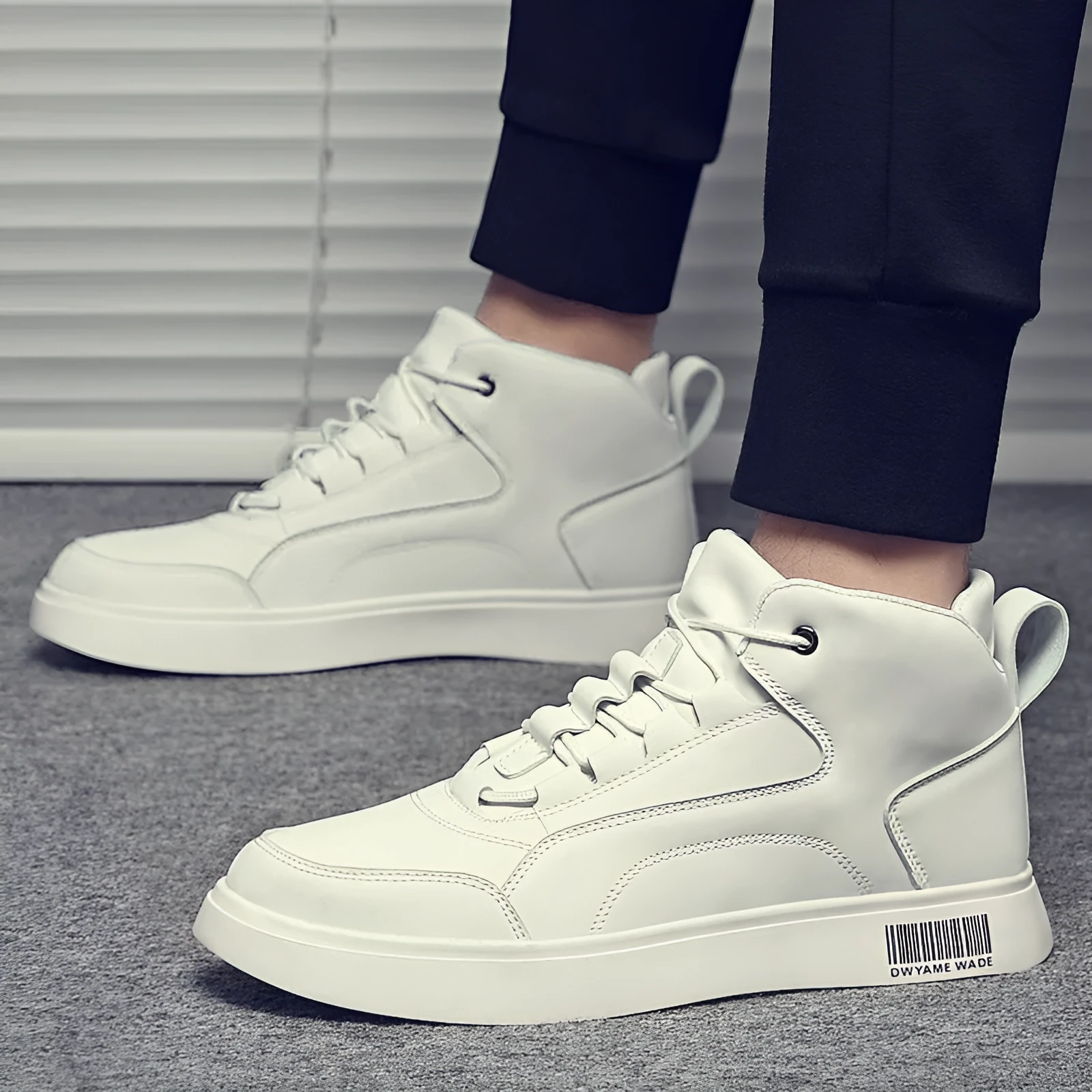 Men's white mid-top casual lace-up shoes with round toe and rubber sole.