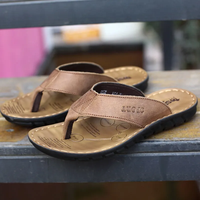 Men's cowhide leather driving flip-flops with rubber sole in black, open-toe style