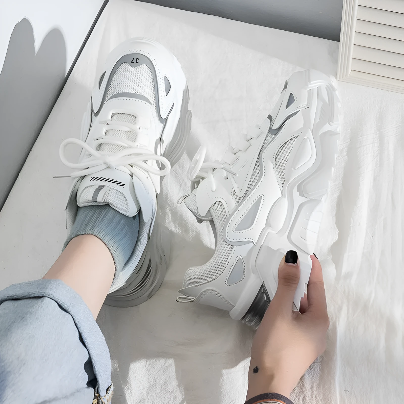 Women's dad shoes thick-soled low-top platform sneakers in white, black, and beige on a light background