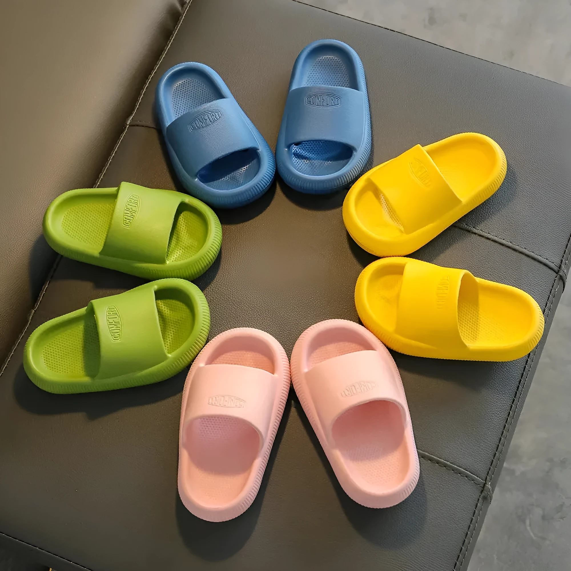Children's mixed colour EVA slippers with a thick non-slip sole, shown in sizes for kids.