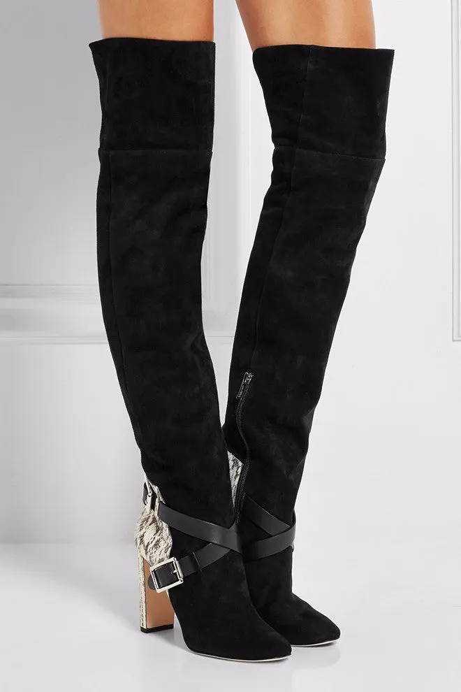 Women's black suede fashion boots with thick super high heel and round toe on a clean background