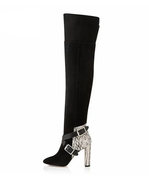 Women's black suede fashion boots with thick super high heel and round toe on a clean background