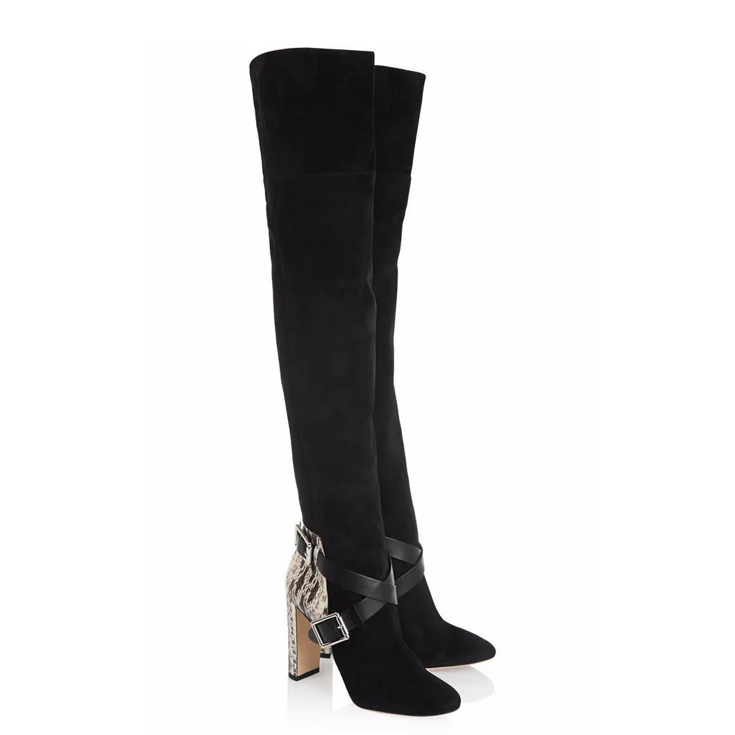 Women's black suede fashion boots with thick super high heel and round toe on a clean background