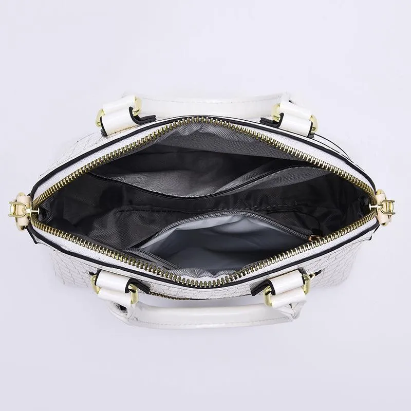 Women's PU crossbody bag shell shape patent leather finish metal detail solid colour daily handbag