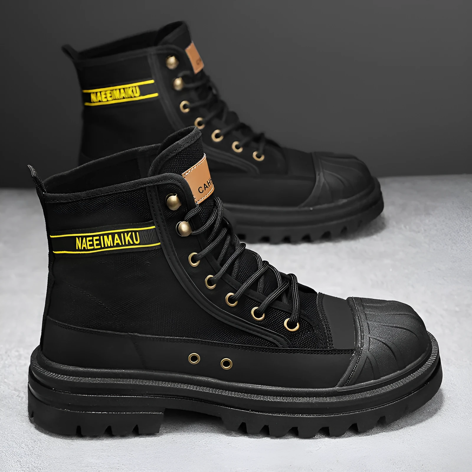Thick-soled canvas men's motorcycle boots in black, side view showing round toe and front lace-up