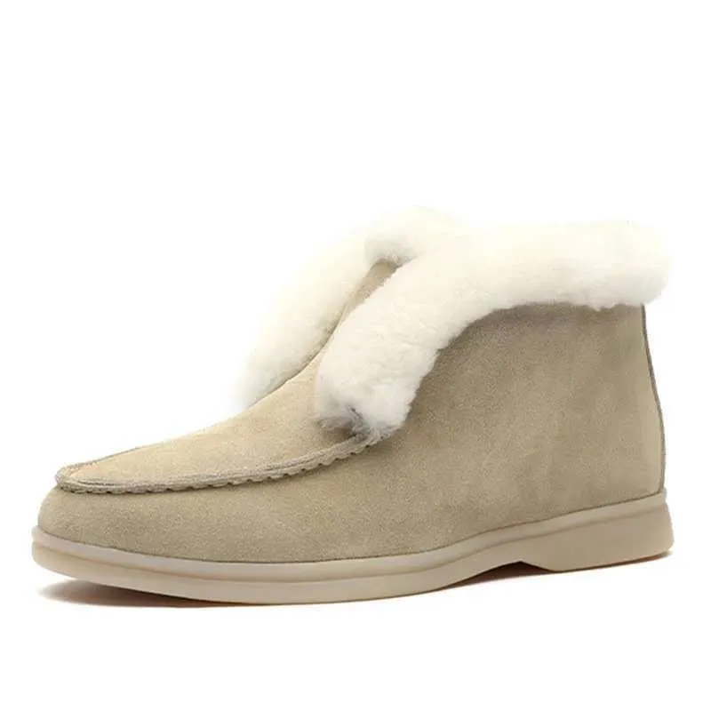 Women's round toe suede Martin boots in beige with rubber sole on a neutral background