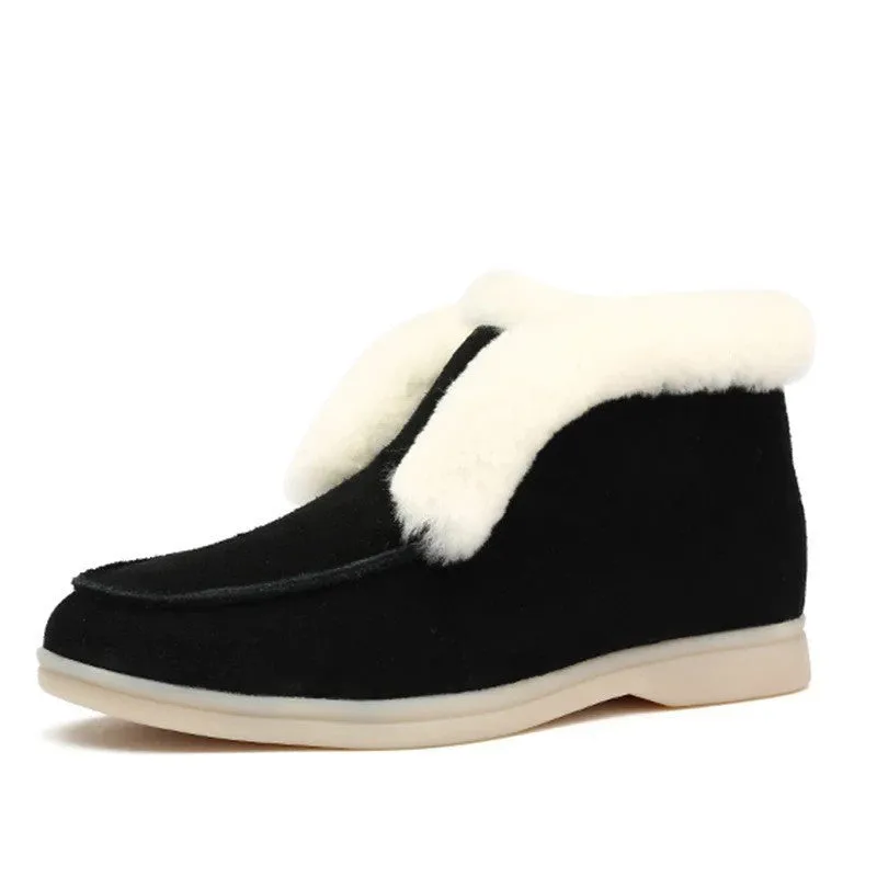 Women's round toe suede Martin boots in beige with rubber sole on a neutral background
