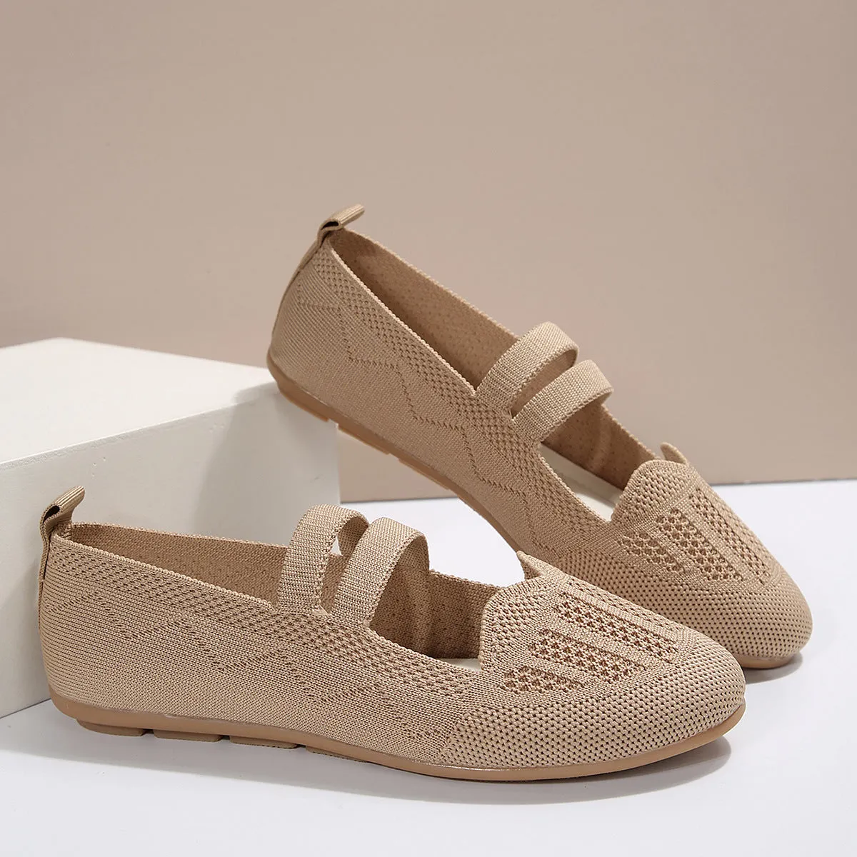 Women's casual mesh slip-on flats in black with round toe, flat heel, and breathable upper