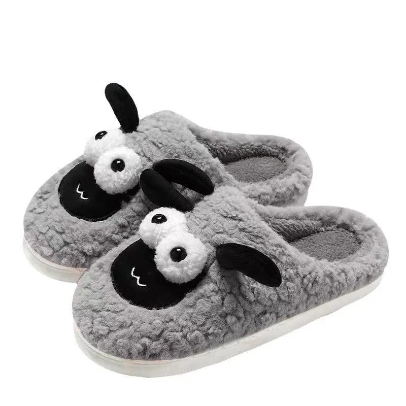 Brown lamb thermal cotton slip-on slippers with suede upper on a wooden floor.