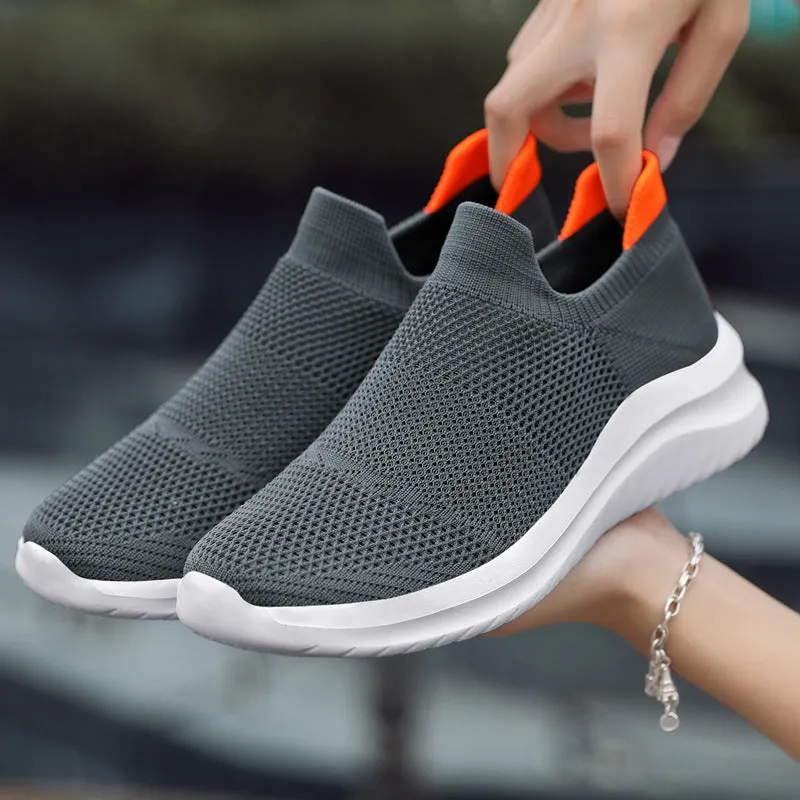 Men's breathable mesh running shoes with MD sole, available in multiple colours, side view on white background