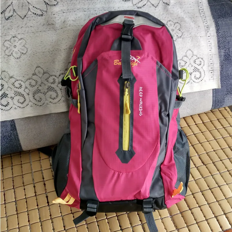 Oxford travel backpack for mountaineering 36-55L in green, plain pattern, side view