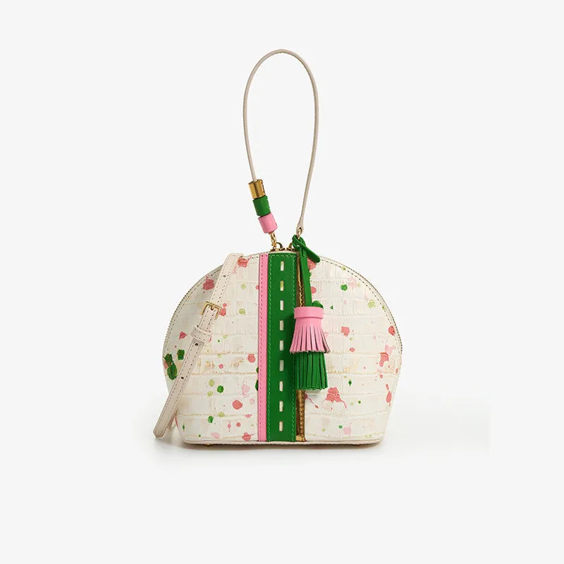 Women's shell-shaped tassel handbag in Gypsophila colour made from genuine cow leather with zipper closure