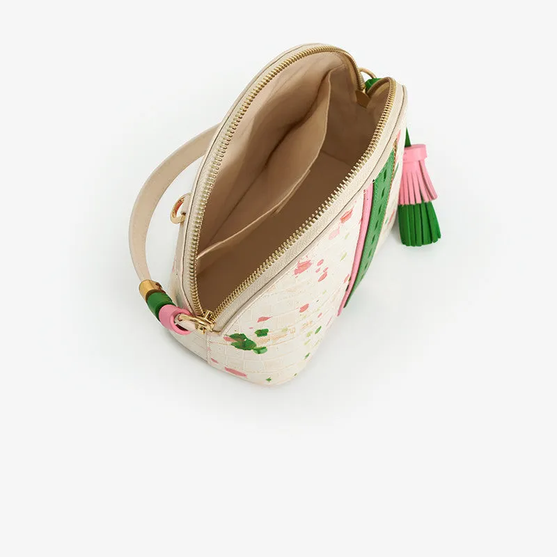 Women's shell-shaped tassel handbag in Gypsophila colour made from genuine cow leather with zipper closure