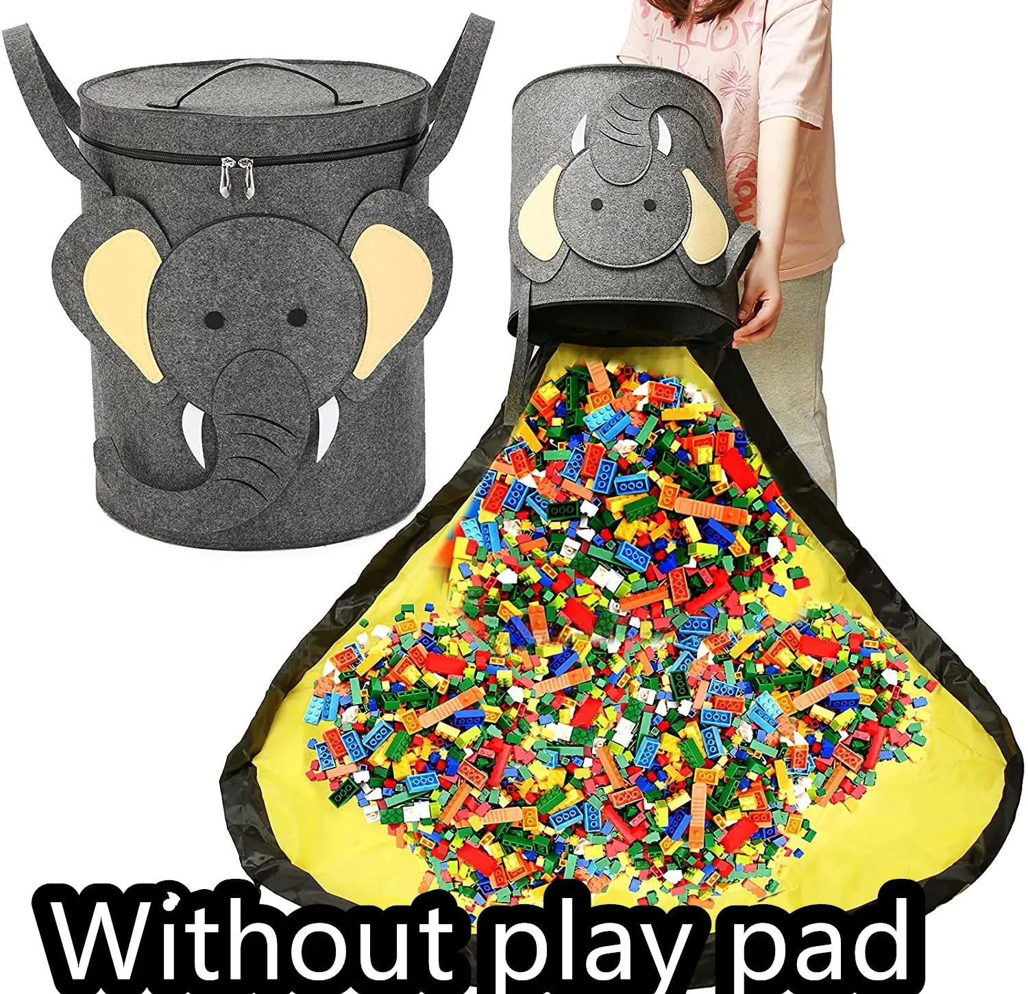 Green felt cube storage bag with pull rope, laid flat as a play mat next to toys.