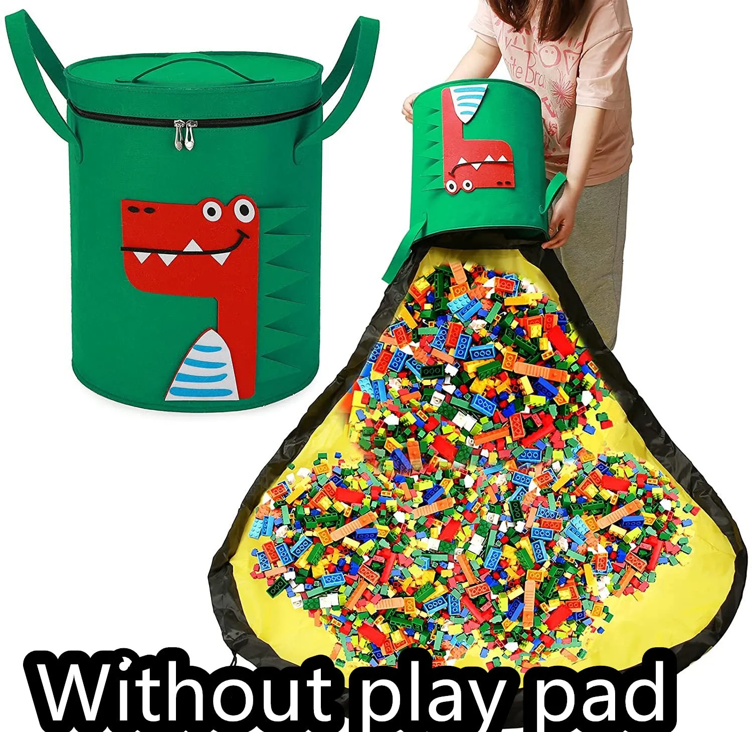 Green felt cube storage bag with pull rope, laid flat as a play mat next to toys.