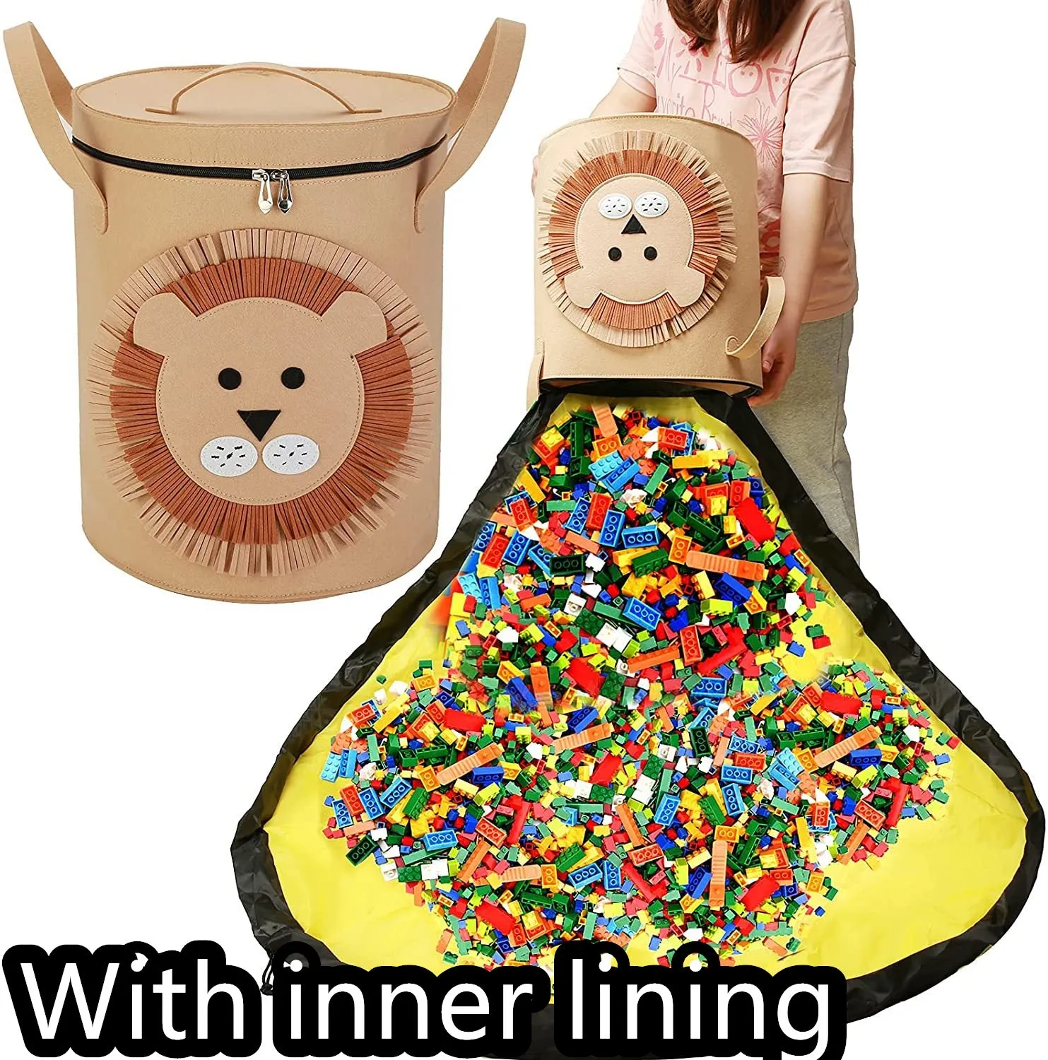 Green felt cube storage bag with pull rope, laid flat as a play mat next to toys.