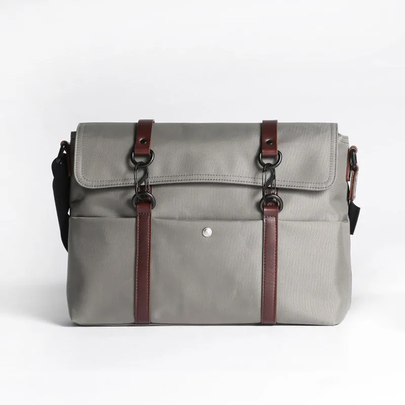 Men's waterproof business tote bag in black, cross-section square shape with zipper closure and soft handles