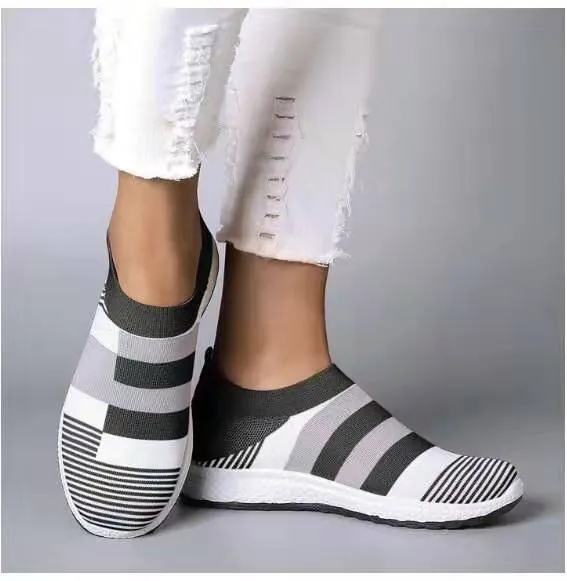 Women's knitted slip-on sneakers in grey with breathable mesh upper and flat foam sole