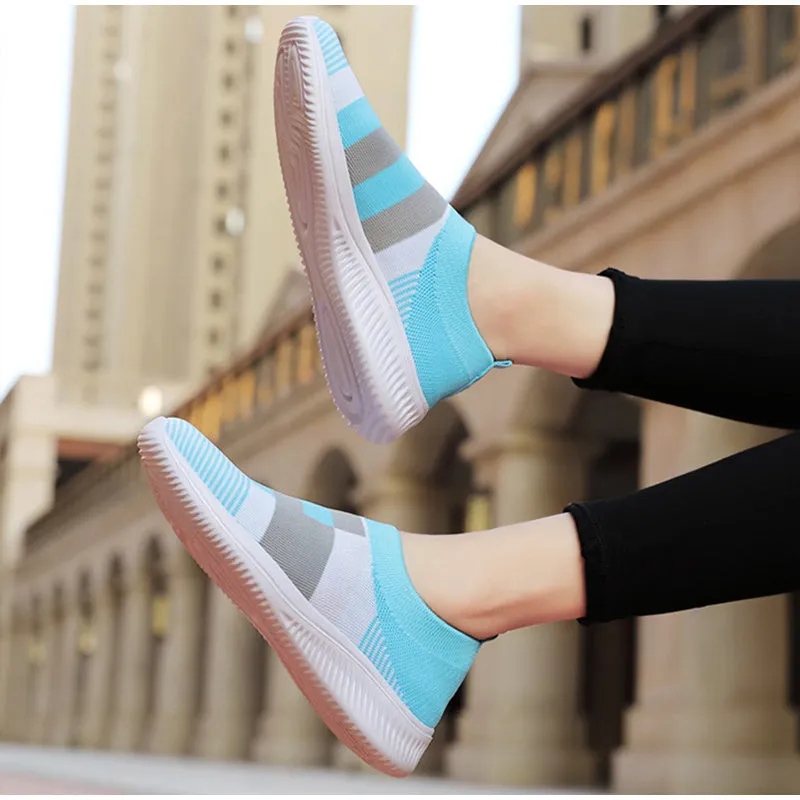Women's knitted slip-on sneakers in grey with breathable mesh upper and flat foam sole