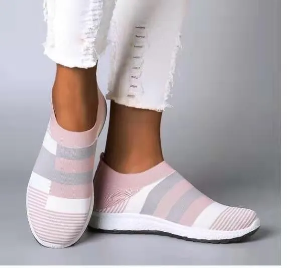 Women's knitted slip-on sneakers in grey with breathable mesh upper and flat foam sole