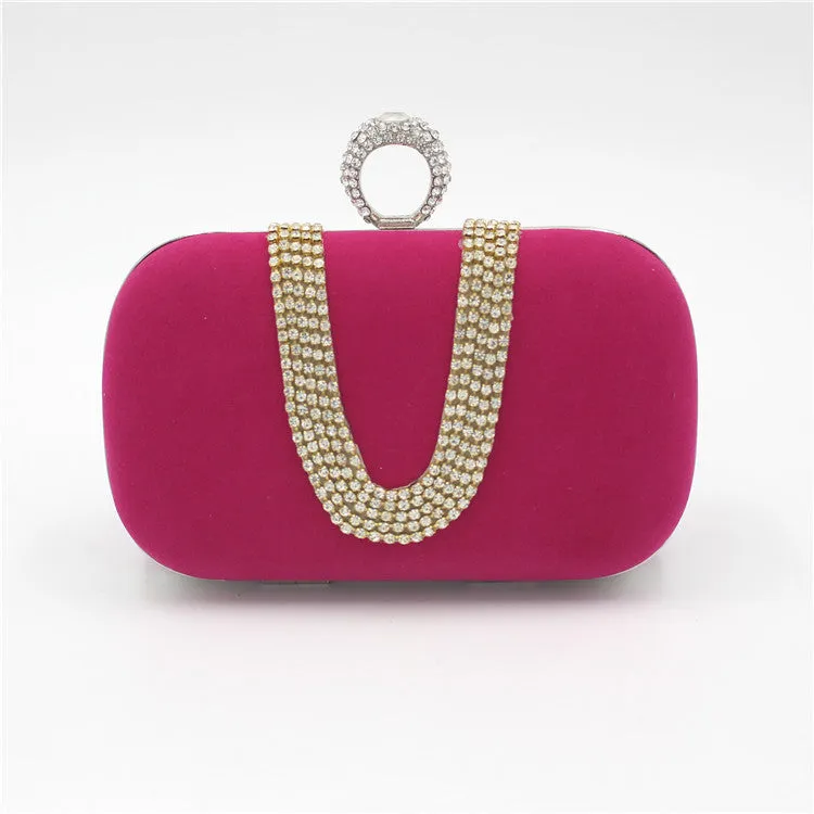 Small velvet evening clutch bag with rhinestones and lock closure, horizontal square shape, available in multiple colours.