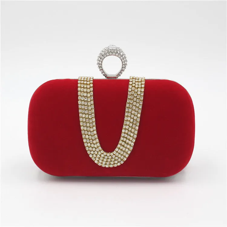 Small velvet evening clutch bag with rhinestones and lock closure, horizontal square shape, available in multiple colours.