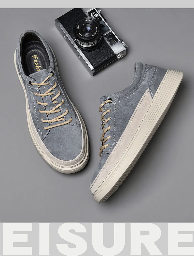 Men's grey pigskin leather casual skate shoes with round toe and flat rubber sole on a light background.